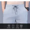 Pantaloni da uomo 2023 Estate Casual Seta di ghiaccio Sottile Sport Pantaloni dritti elastici Traspirante Asciugatura rapida Goccia 230715