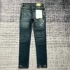 Jeans da uomo viola tendenza pantaloni firmati di marca strappati dritti regolari larghi lavati vecchio buco lungo stack Rvmn ZM10