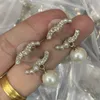 Kalp şeklindeki küpeler tasarımcısı stud lüks kadınlar ccity elmas inci küpe klasikleri mücevher kadın c kearing 5243