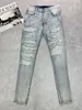 Pantaloni jeans da uomo firmati Jean Pantaloni strappati Disegni di marca Lettera Strass Moto da uomo Pantaloni skinny da cowboy Hip Hop Street