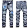 Nya ami -män kvinnors designers jeans oroliga rippade cyklist smala rak denim för män tryck armé mode mans mager byxor