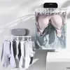 Appendini Stendibiancheria da parete multifunzionale Appendiabiti autoadesivo Reggiseno pieghevole per biancheria intima Clip per calzino Supporto in plastica antivento