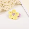 Anneaux de fleurs au crochet anneaux floraux doux colorés pour enfants filles fleurs à tricoter bagues enfants cadeau décor accessoires