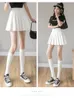 Kjolar preppy stil hög midja solid veckad minikjol kvinnor sommar vår koreansk mode söt vit a-line kjolskort kläder 230717