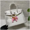 Platinum Luxurys Leather Handtas 2024 Crocodile Patroon Tas Macaron Series Damestas Draagbare koehide damestas mode één schouder damestas