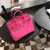 Platinum Luxurys Leather Handbag Rose Red Bag 2024 Fashion Versatile Togo Litchi Pattern Bridal Bag