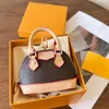 Mini borsa a conchiglia Portachiavi Designer Portamonete Ciondolo borsa da donna in pelle stampata Moda donna di alta qualità Portachiavi regalo di compleanno Portamonete con scatola