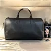 beauté tête designer duffle sacs unisexe sacs de voyage De Luxe Sac À Main Marque Haute Qualité En Cuir Bandoulière femmes hommes bagages 230715