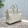 Sac à main en cuir en cuir luxurys qu'elle a utilisé pour coudre un sac de femmes portable bk25bk30togo sac swift milkshake par