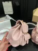23SS Designer-Damentaschen Mini-Rucksack Luxus Duma Pearl Pink Rucksäcke Umhängetaschen Umhängetaschen Geldbörsen Kartenhalter Gesteppte Mini-Handtaschen aus echtem Leder mit Box