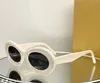 楕円形のサングラスアイボリーダークグレーレンズ女性のための夏サニーガファスデルソンネンブリルUV400アイウェアボックス