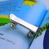 Keychains 1Pc Novelty Souvenir Metal Skateboard Key Chain Keyring Creative Gifts Ring Stainless Steel Car Bag Chains