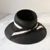 Cappello da secchiello per protezione solare da viaggio per donna con fiocco vuoto per la primavera e l'estate