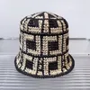 Designers masculins chapeaux de seau de mode de luxe de luxe Herbe Braid Cap pour hommes pour hommes femmes décontractées de voyage de voyage de voyage de voyage à la mode