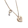 Designer necklaces full diamond heart-shaped necklace female titanium steel fashionable full diamond key small lock love pendant collar necklace