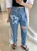 Kvinnors jeans långa byxor kvinnor ihåliga hög midjehål tryck lösa dambyxor casual modis kvinna 2023