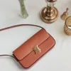 Spegelkvalitet tonåring triomfes klassiska klaff crossbody väska designer kvinnor koppling axel baguett till och med väska lyxväska man handväska läder kuvert tygväskor