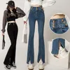 Kvinnors jeans dambyxor 2023 vår sommaren chic kläder frontknapp hög midja denim byxor med split hemsvart/blå casual wears