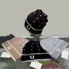 ファッションデザイナーの帽子男子と女性のビーニー秋/冬のサーマルニットハットスキーブランドボンネットスカルハットウォームキャップ