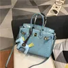 Platino luxurys handbag cuero de cuero bolso para mujer sesgo straddle bolso real de moda