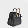 Platinum Luxurys Leather Handbag Bag Womens Bag Togo Top Layer Lychee Grain Calfskin Lock Bridal Bag