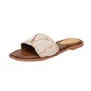 Kvinnors sandaler tofflor broderi designers glider sandal blommig brokad flip flops randig strand läder gummi blomma tofflor