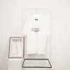 BLCGレンシアサマーTシャツハイストリートヒップホップスタイル100％コットン品質の男性と女性ドロップスリーブルーズTシャツ特大トップ23148