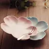 Tazze Piattini Tazza da caffè a forma di fiore in ceramica europea di lusso con piattino Vassoio da dessert Set Piatto da latte pomeridiano romantico