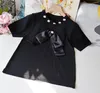 Maglioni da donna Runway Donna Estate All-Fiammifero Nero Bianco Maglieria Girocollo Pullover a maniche corte Bowknot Perline T-shirt in maglia sottile Top