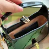 5a Kwaliteitsketen Handtas Lady Schoudertas Subaxillary Tassen Crossbody Purse Cow Echt lederen Patent Serpentine Fashion Jackie Gold Metal Clasp Clutch 699651