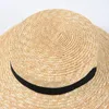 Cappelli larghi brim cravatta cappello da spiaggia paglia per donne modella in passerella bassa