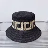 Diseñadores de hombres Sombreros de cubo Moda Marca de lujo Gorra de trenza de hierba para hombre Mujer Verano Casual Playa Viajes Vacaciones Sombreros de paja de moda