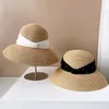 Cappelli a tesa larga Cappello di paglia stile stilista giapponese per donna Summer Beach Sun Outdoor Bucket Berretto di lusso di alta qualità