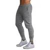 ny het försäljning solid casual mens casual smal fit tracksuit sport solid manlig gymnastik bomull mager joggar svettas avslappnade byxor