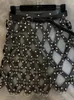スカート2023秋のPUレザースカート女性セクシーなダイヤモンドグリッドを空洞化します