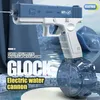 Sand Play Water Fun Electric Glock GesmbH brinquedo pistola de água explode Crianças de alta pressão carregamento poderoso spray automático 230718