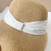 Cappelli a tesa larga Cappello di paglia stile stilista giapponese per donna Summer Beach Sun Outdoor Bucket Berretto di lusso di alta qualità