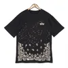 Summer Men's T-shirts kvalitetsdesigner män amirs t-shirt tryck t-shirts kort ärm avslappnad bokstav t-shirt lös mäns tee crewneck överdimensionerad tee graffiti t-shirts