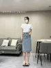 スカートデザイナー高品質のフィルムトライアングルラベルレースロングドレスユニークなカッティングステッカーファブリックトレンドYnti