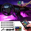 Luci interne per auto 4 pezzi Lampada al neon a incandescenza per atmosfera da pavimento Striscia musicale multicolore Kit di illuminazione decorativa sotto il cruscotto211C