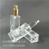30 ml tomt klart glas parfym sprayflaska 1 oz påfyllningsbar fyrkantig atomizer med svart guld svart pump cap taofg