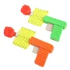 Novelty Games Drivable Fist Shooter Trick Toy Gun Funny Child Prank Toys Kids Plastic Festival Gift For Fun Classic Elastic Telescopic 230718