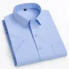 Chemises habillées pour hommes en chemise de grande taille été à manches courtes pour hommes coupe ajustée bureau formel vêtements solides blanc concepteur uni