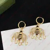 Bee Flash Diamond Vintage studs earrings Designer earrings Gold Metal travel gift party