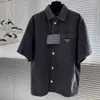 Abrigo de manga corta de mezclilla vieja de lavado vintage para hombres de verano, camisa de mezclilla de manga corta con etiqueta triangular clásica, informal suelto, retro todo.