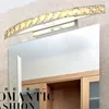 Lampada da parete Nordic Minimalista Specchio di cristallo Luce frontale LED Toilette Bagno Spogliatoio curvo in acciaio inossidabile A prova di umidità