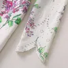 Lässige Kleider, grüne Blätter und lila Blumendruck, ausgehöhlte Stickerei, O-Ausschnitt, lange Ärmel, offene Taschen, elegantes Damenkleid