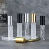 Parfüm Şişesi 24 PCSlot 5ml 10ml Şeffaf İnce Cam Sprey Şişe Örnek Cam Şişeler Taşınabilir Mini Parfüm Atomizer Altın Gümüş Siyah Kapak 230717