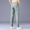 Erkek pantolon yaz rahat ince yumuşak esneklik dantel yukarı bel düz renkli cep aplike Kore gri siyah iş pantolonlar erkek 38 230718