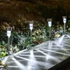 Décorations de jardin 4 12Pcs Lampes solaires Lanterne électrique extérieure Lumière Waterpoof Éclairage paysager pour Path Yard Lawn Lamp 230717